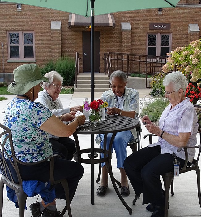 Sisters in Courtyard